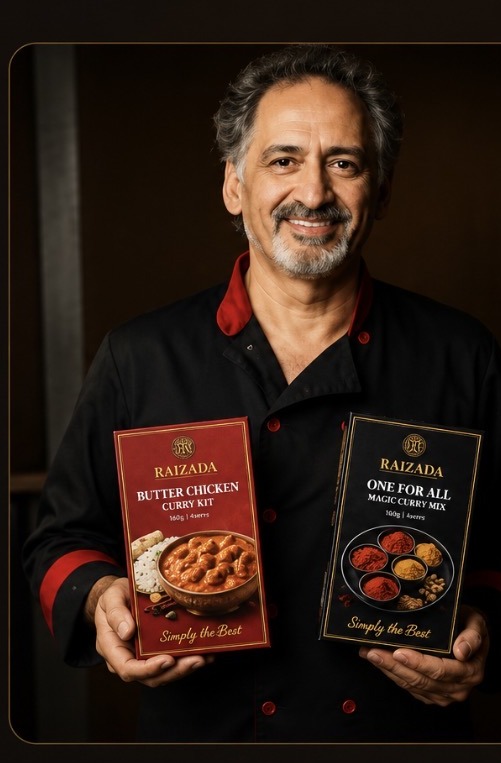 Roger Raizada, founder of Raizada Flavours, holding the Butter Chicken Kit and One For All Magic Curry Mix